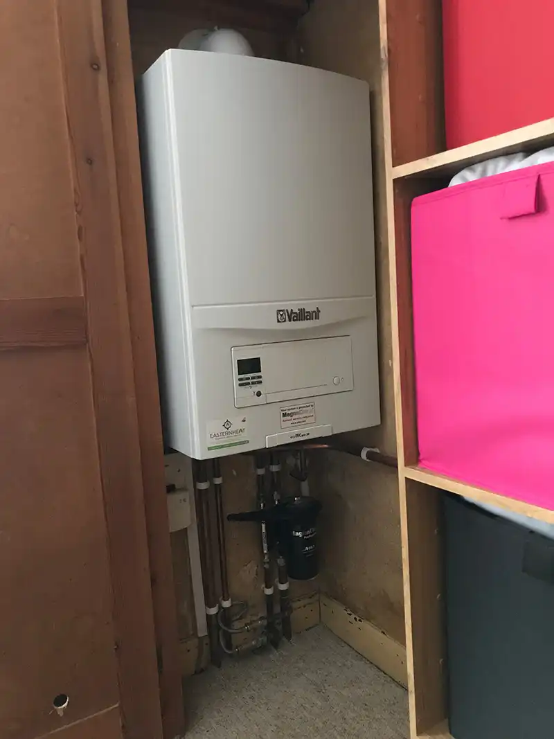 Airing cupboard combination boiler installation