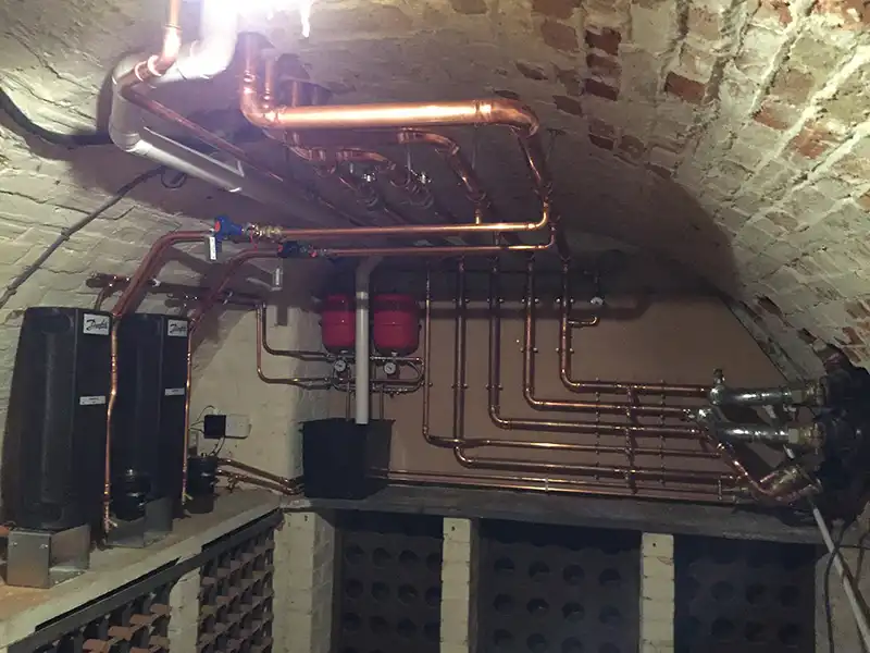 Large Stately Home heated off large Ground Source Heat Pump via 10 separate plate heat exchangers
