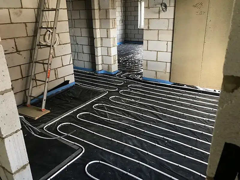 Underfloor heating pipework throughout house